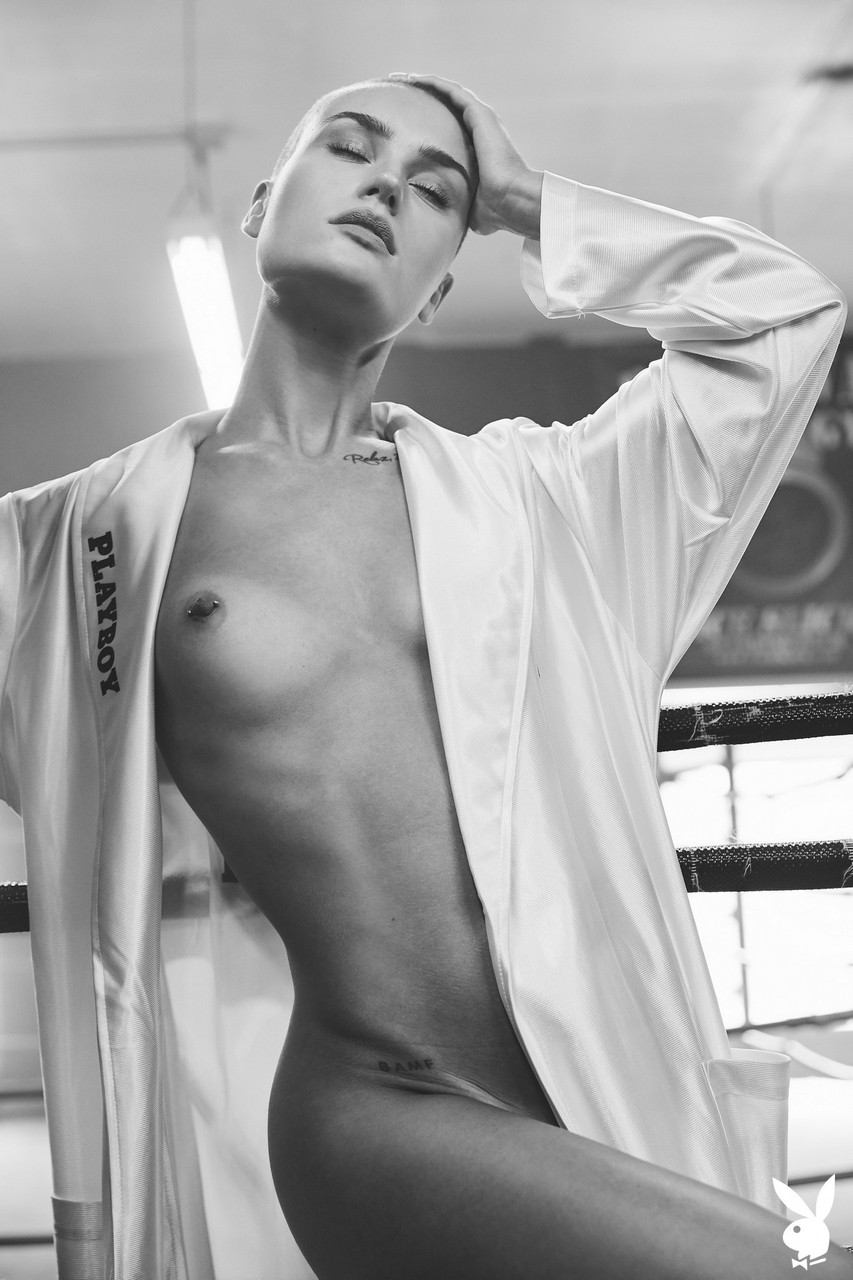 Photos of bald fit model Vendela in boxing gear and exercising naked in the...